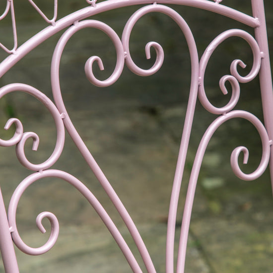 A close up of a Roborough 2 Seater Bistro Set Coral chair for home furniture from Kikiathome.co.uk.