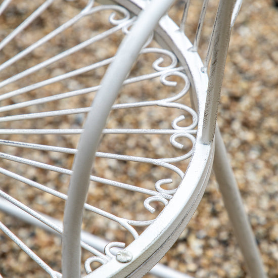 Close up of a Branscombe 2 Seater Bistro Set Vanilla garden chair for home decor.