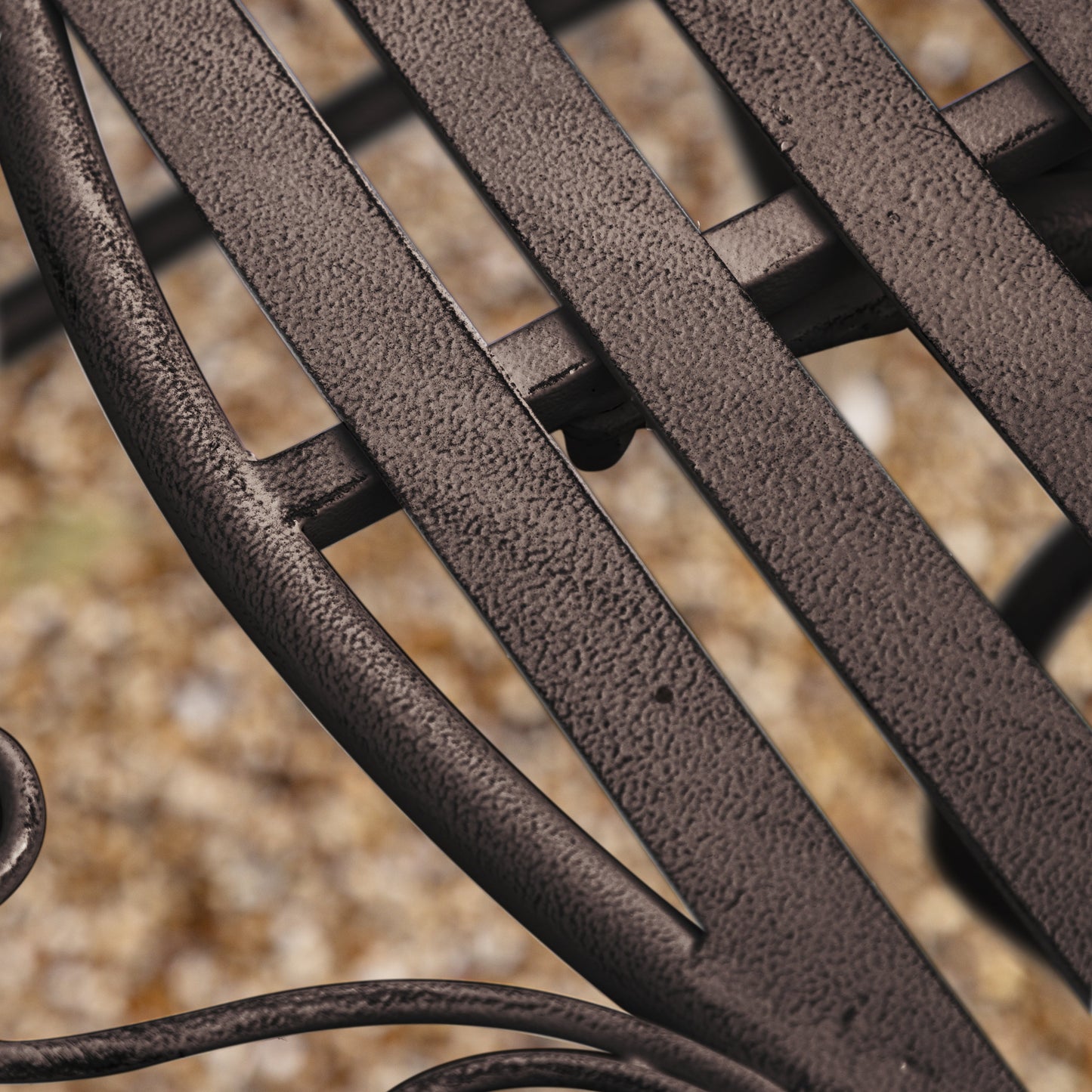 A close up of a Branscombe 2 Seater Bistro Set Noir chair from Kikiathome.co.uk, perfect for interior decor.